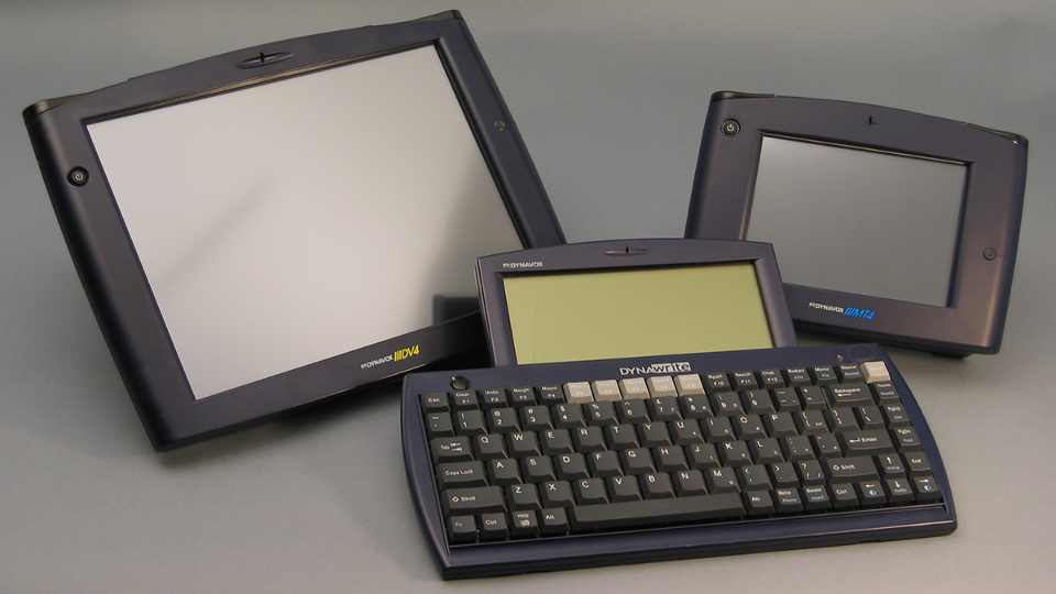 A large version and a smaller version of an augmentative communication device is shown. Each is a touch screen that allows the person to tap images and words to have the device speak for them.