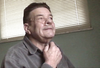 A COPD patient is interviewed while wearing an oxygen tube connected to his nose.